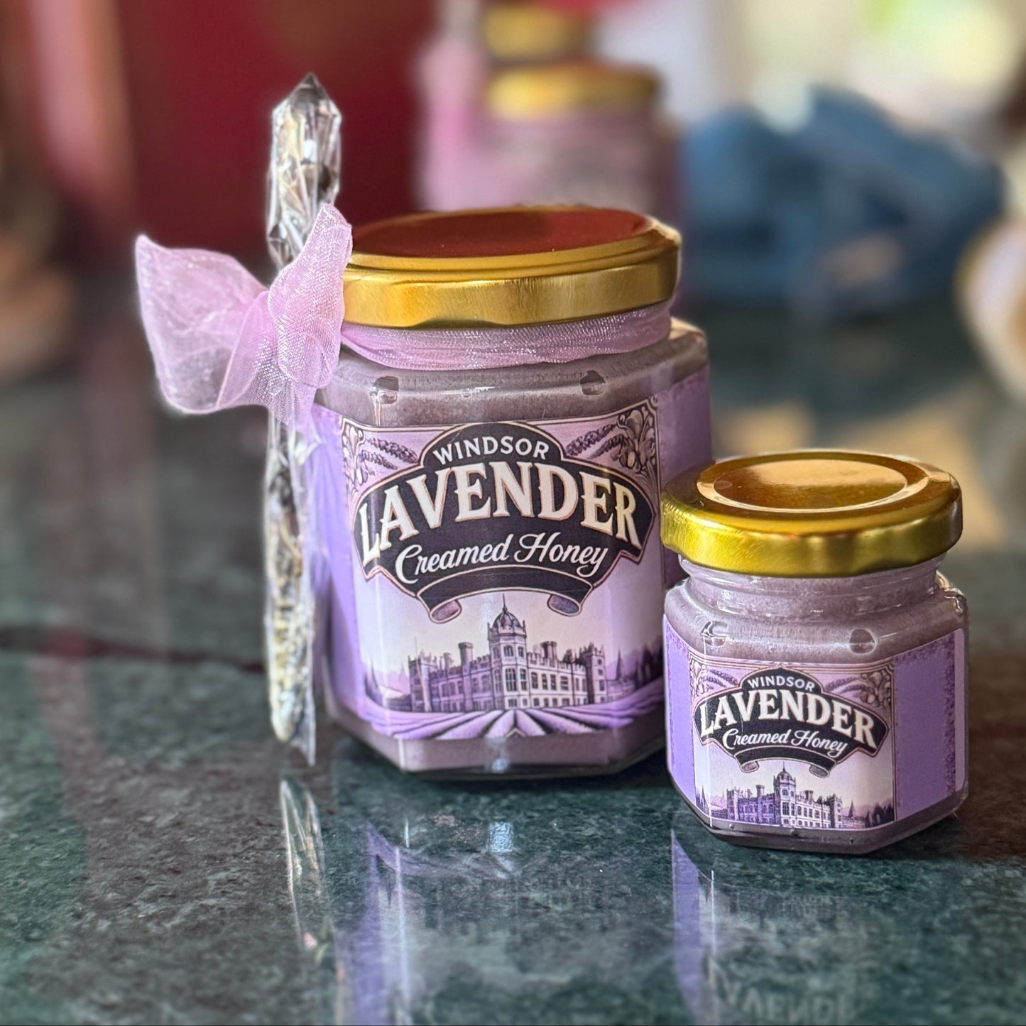 Handcrafted Lavender Creamed Honey in a beautifully designed jar, featuring the perfect harmony of smooth, creamy honey and fragrant lavender. Made with raw, natural honey, this gourmet treat offers a gentle, floral sweetness ideal for pairing with cheeses, drizzling over desserts, or adding to your favorite beverages. Whether as a gift or a pantry staple, Lavender Creamed Honey brings a touch of elegance and sophistication to any occasion