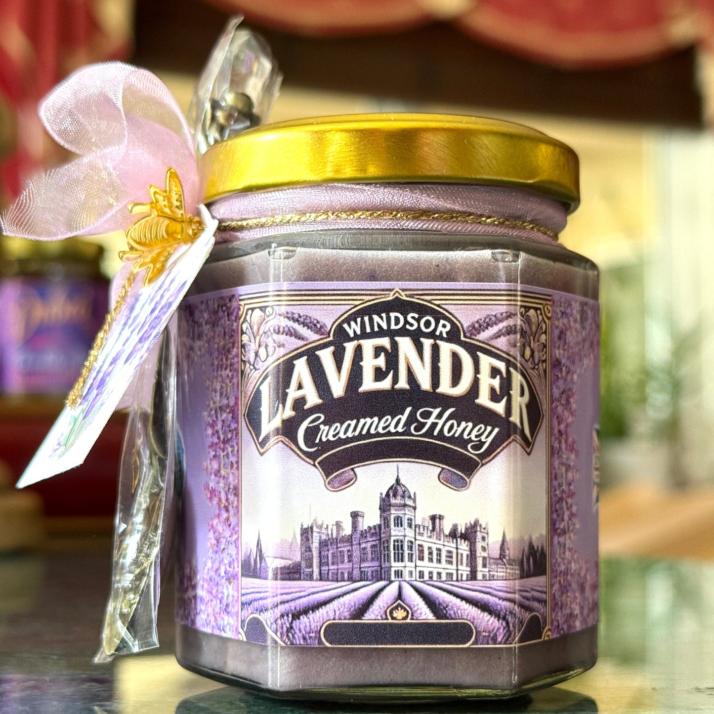 Premium Lavender Creamed Honey, showcasing the perfect blend of smooth raw honey infused with delicate lavender, ideal for adding floral sweetness to teas and desserts