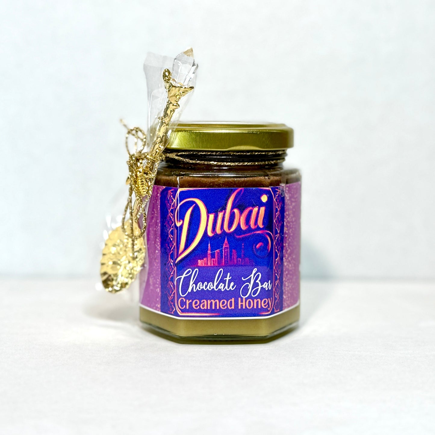 Premium Dubai Chocolate Creamed Honey with smooth pistachio cream and Nutella ganache, ideal for drizzling over baked goods or fruit