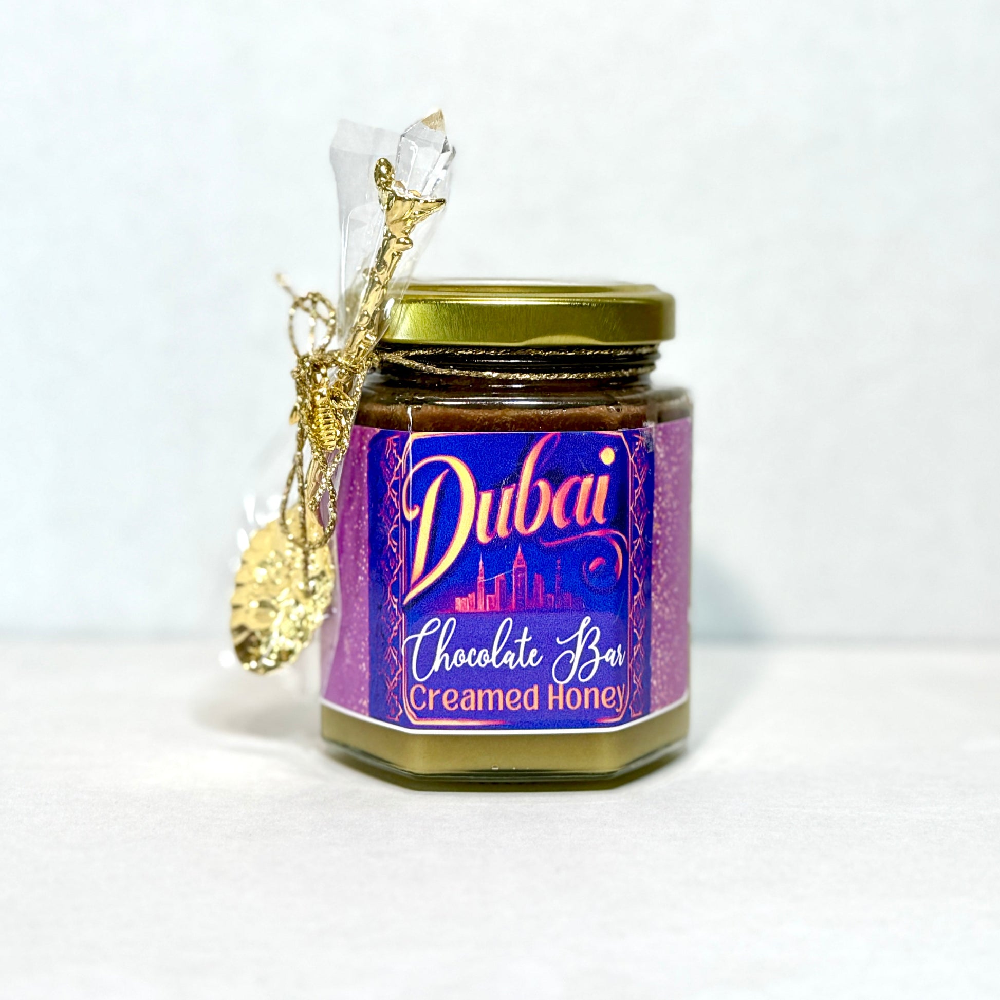 Premium Dubai Chocolate Creamed Honey with smooth pistachio cream and Nutella ganache, ideal for drizzling over baked goods or fruit