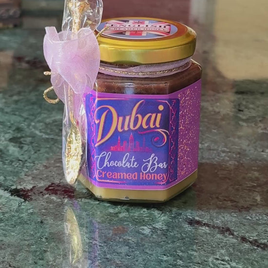 Gourmet Dubai Chocolate Creamed Honey with a decadent pistachio and Nutella ganache layer, perfect for upscale tea-time treats.