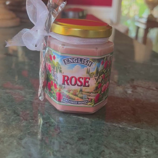 Luxurious English Rose Creamed Honey, a delicate blend of floral rose essence and creamy honey, ideal for enhancing desserts and gourmet treats